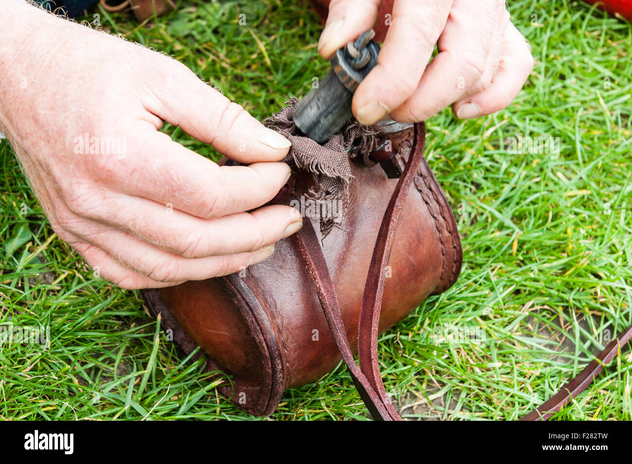 England. Handmade medieval costrel, a leather water or mead bottle