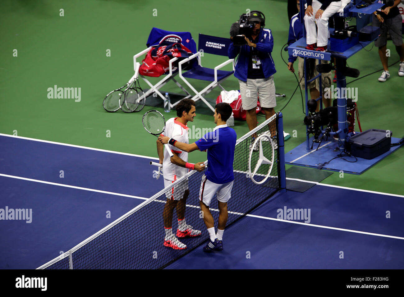 New York, USA. 13th Sep, 2015. Novak Djokovic of Serbia shakes hands with Roger Federer after Djokovic defeated him 6-4, 5-7, 6-4, 6-4 in the final of the U.S. Open at Flushing Meadows, New York on September 13th, 2015. Credit: Adam Stoltman/Alamy Live News Stock Photo