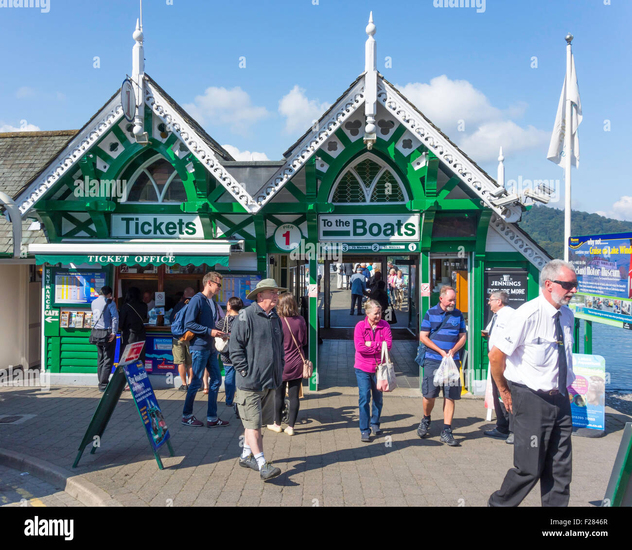 A busy scene at the ticket offices for lake cruises at Bo'ness Lake Windermere Cumbria Stock