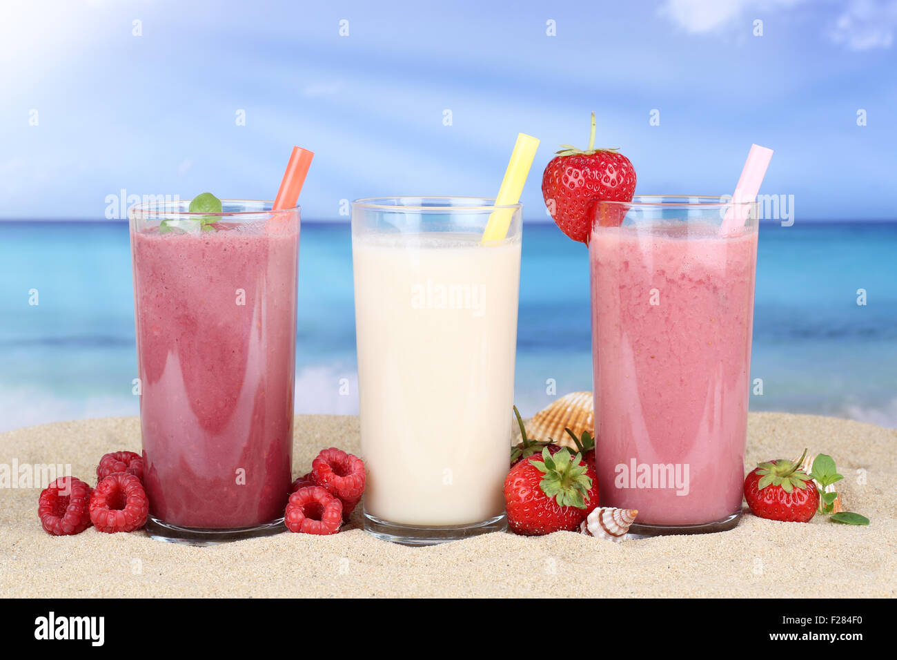 Smoothie fruit juice with fruits in summer on the beach Stock Photo Alamy