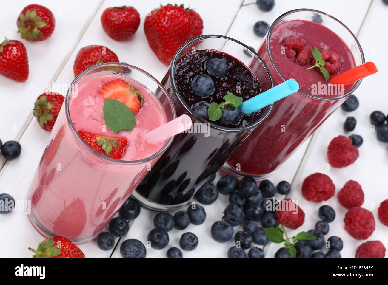 Smoothie fruit juice milkshake with fruits in summer Stock Photo Alamy