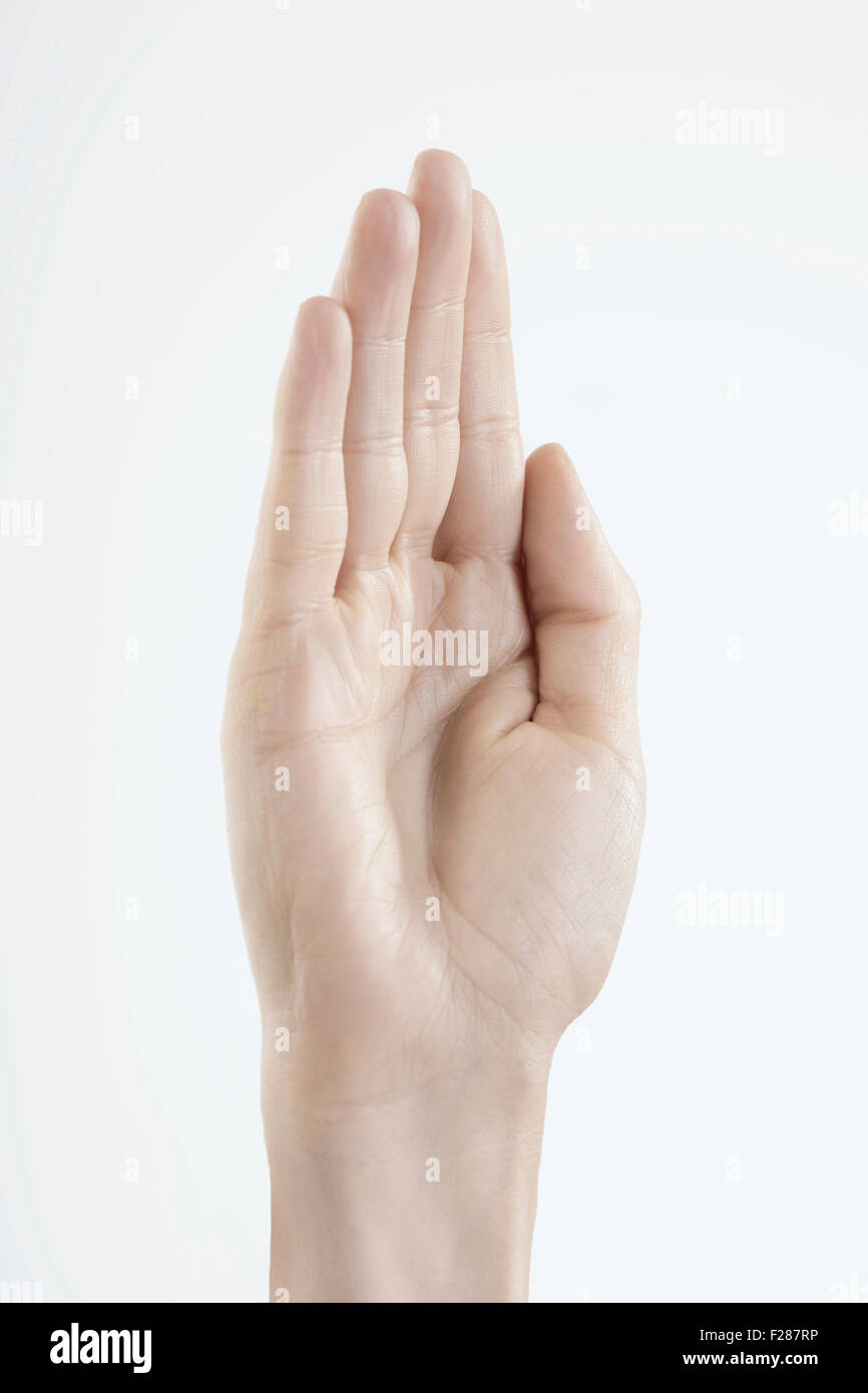 Close-up of woman's hand making oath gesture, Bavaria, Germany Stock Photo