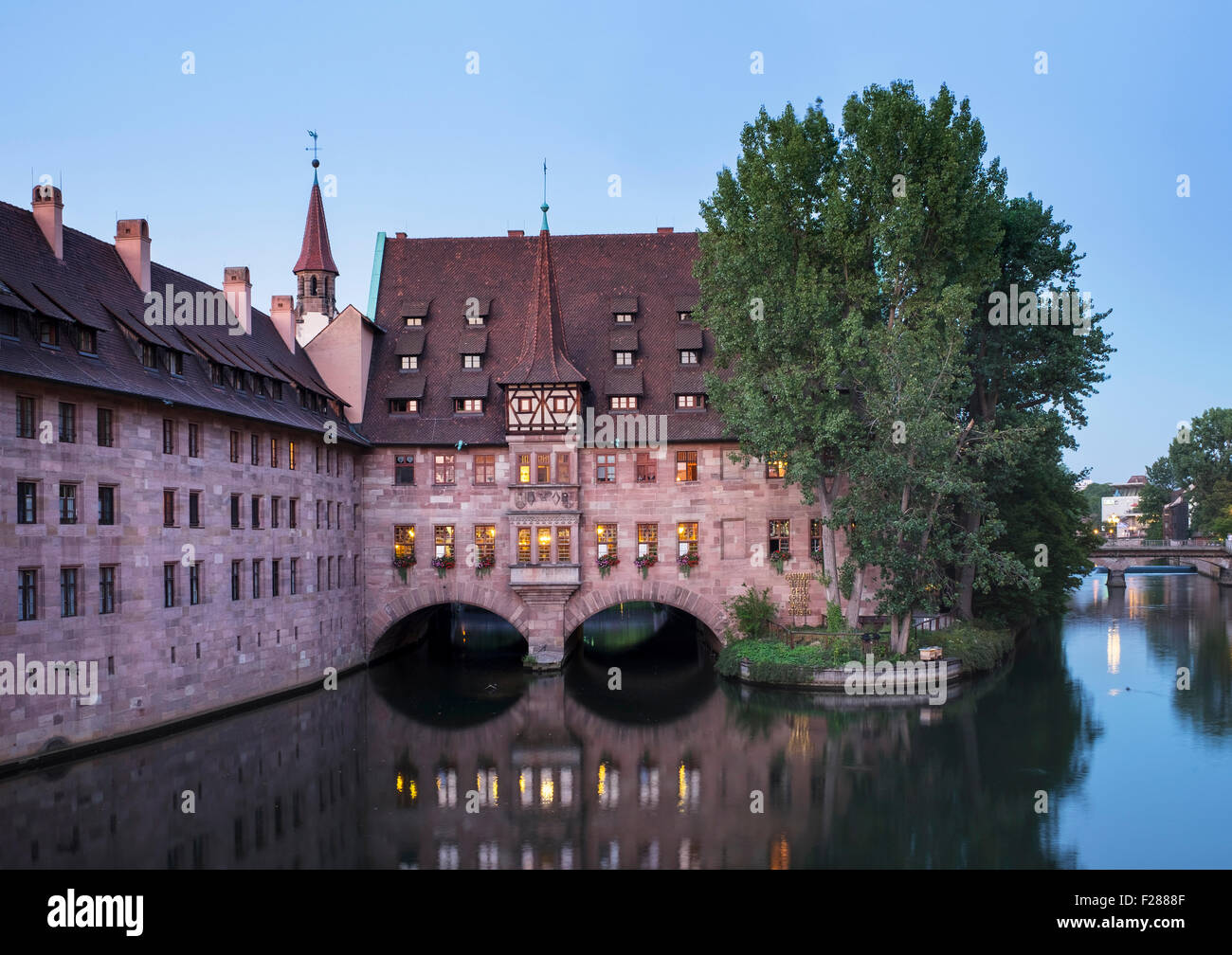 Heilig-Geist-Spital, infirmary, beside the Pegnitz river, historic centre, Nuremberg, Middle Franconia, Franconia, Bavaria Stock Photo