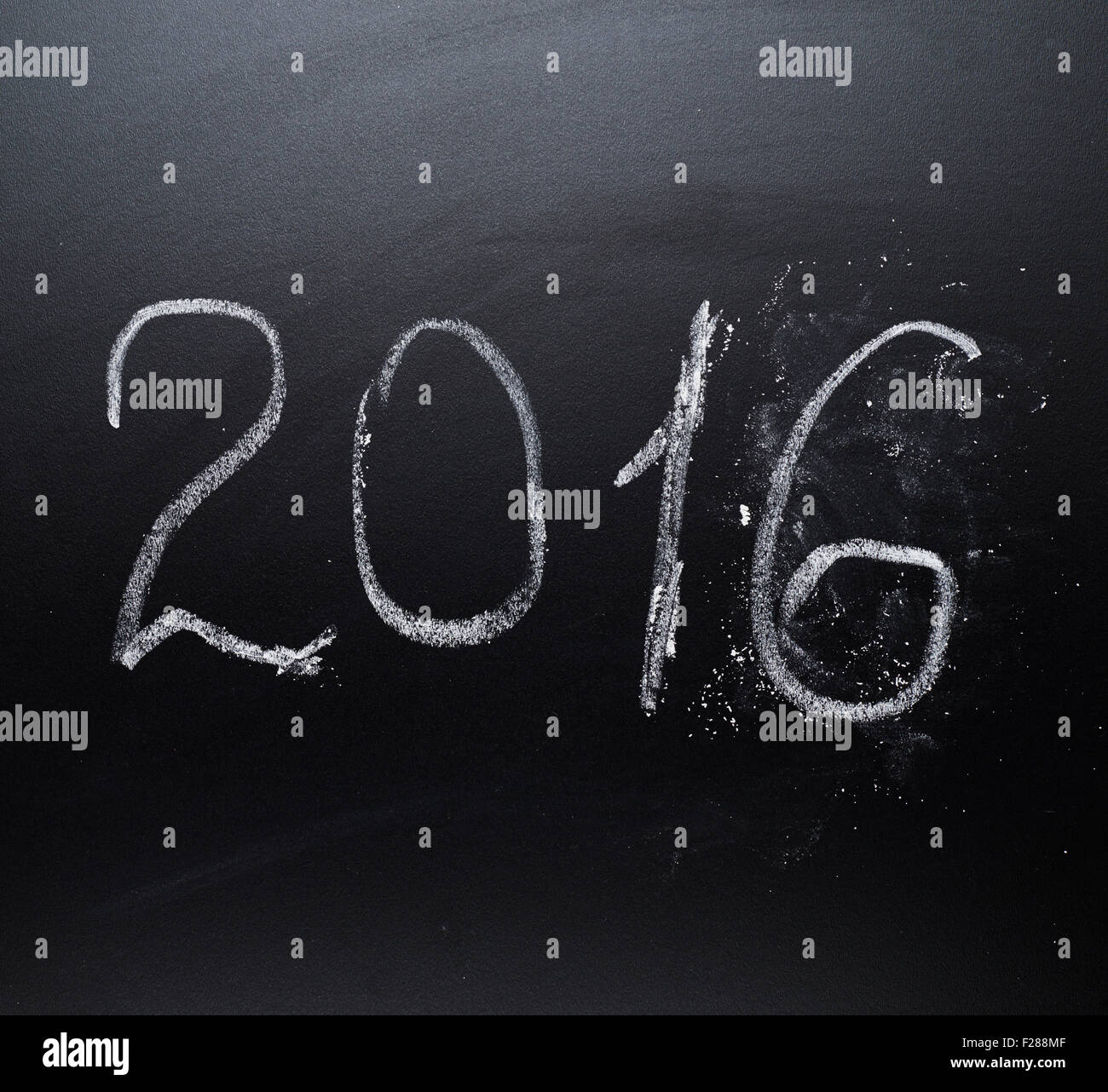 Year number 2016 written with the white chalk on the blackboard Stock ...