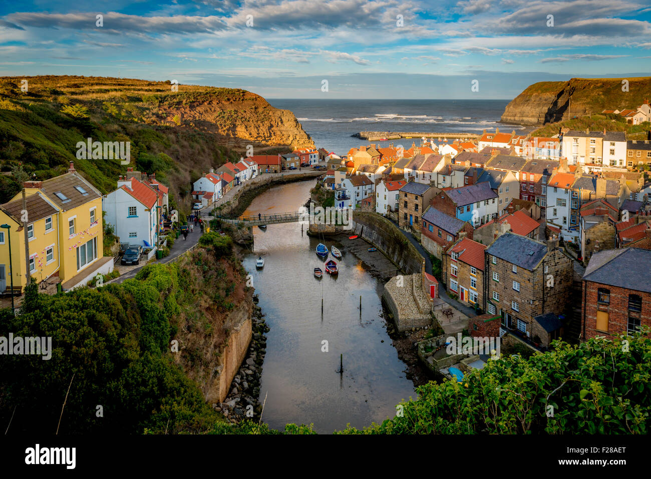 Staithes beck and village shot from Cowbar Bank. Staithes, once the home of Captain James Cook, North Yorkshire, UK. Stock Photo