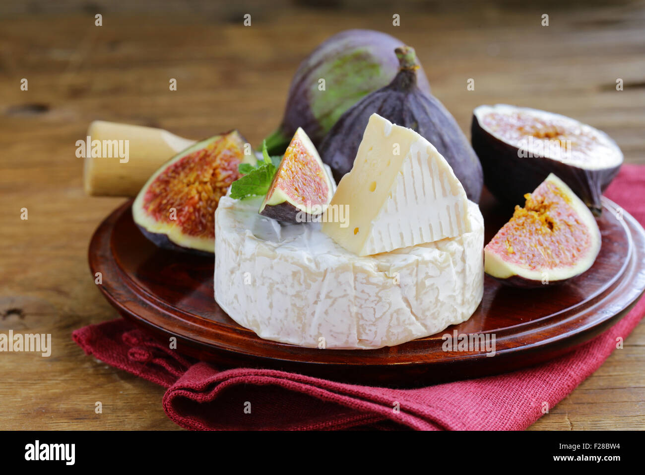 Cheese with white mold (Camembert, Brie) with fresh figs Stock Photo Alamy