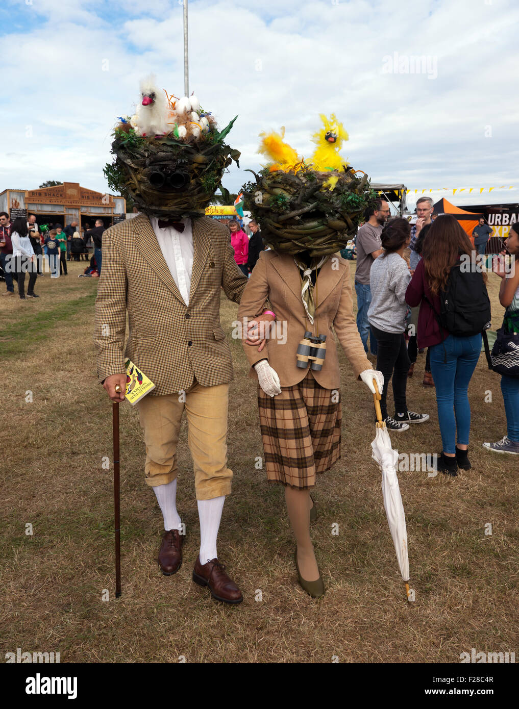 'Twitchers' with birds nest heads,  entertaining the crowd at the On Blackheath Music Festival Stock Photo
