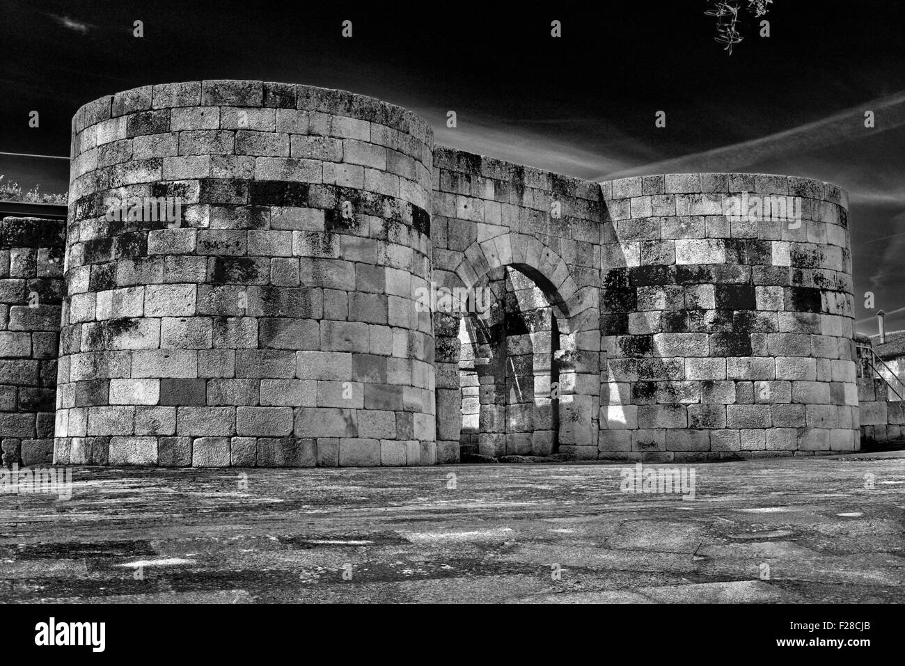 Portugal: Historic gateway of the former roman wall (4th century) in Idanha-a-Velha (bw) Stock Photo