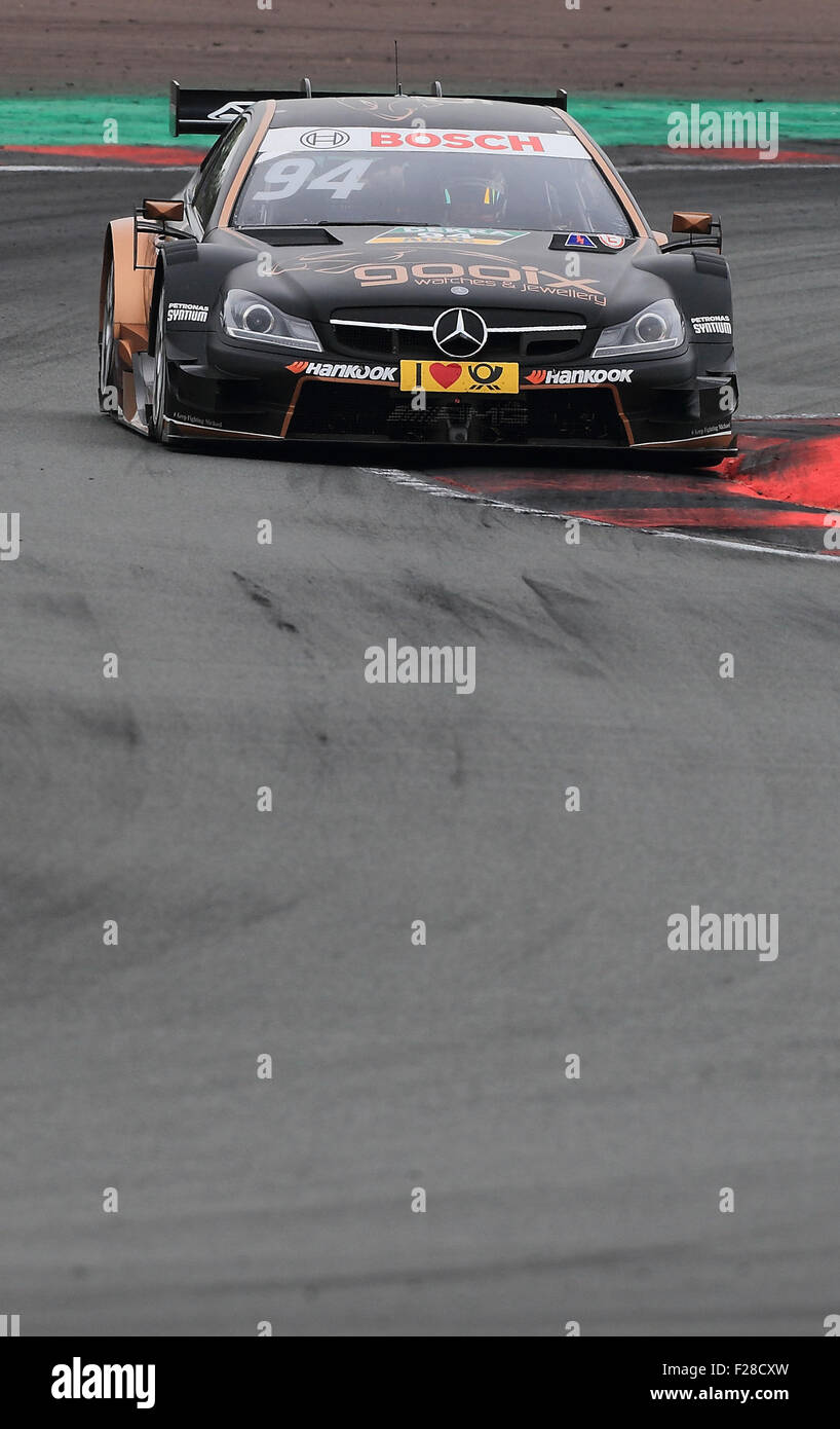 Oschersleben, Germany. 13th Sep, 2015. Pascal Wehrlein with his Mercedes racing car in action during the 'Deutsche Tourenwagen Masters, DTM', German Touring Car Masters, at the Metropolis-Arena race course in Oschersleben, Germany, 13 September 2015. Photo: Jens Wolf/dpa/Alamy Live News Stock Photo