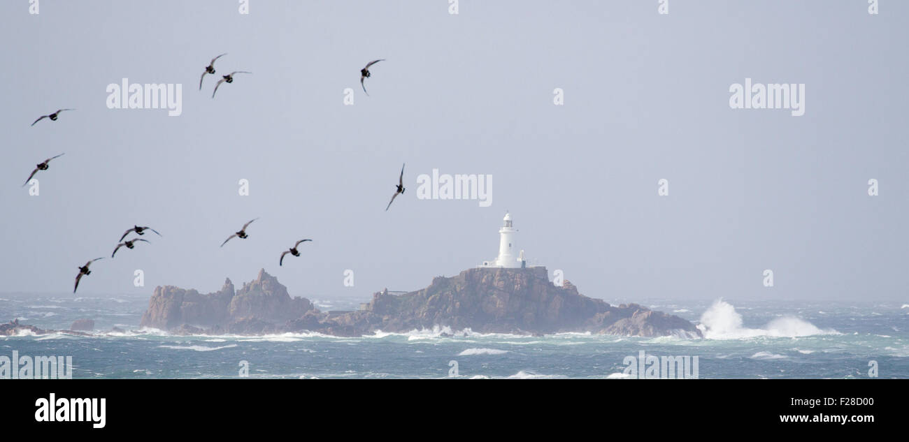 Jersey, Channel Islands, UK. 14th Sep, 2015. UK Weather: Morning storm  winds gusting to over 50mph & heavy seas at La Corbier Lighthouse Credit:  Gordon Shoosmith/Alamy Live News Stock Photo - Alamy
