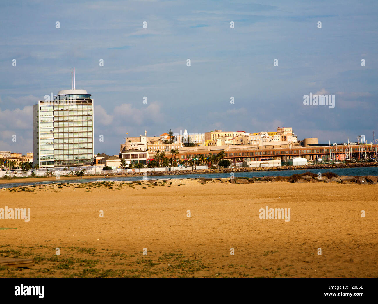 Sandy beach with view to historic walled fort of Melilla la Vieja, Melilla autonomous city state Spanish territory  north Africa Stock Photo