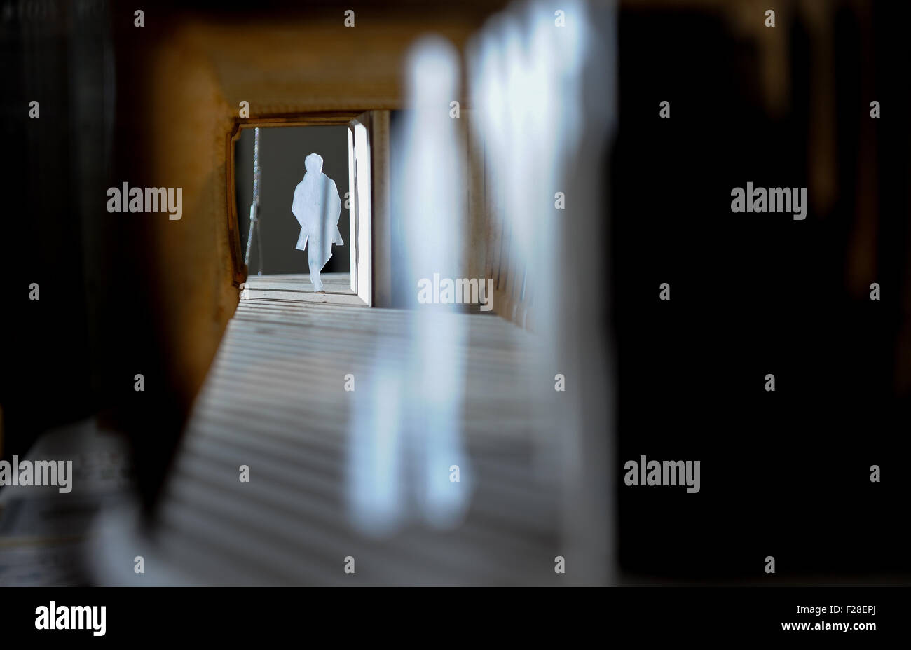 a model of a man walks through a tunnel Stock Photo