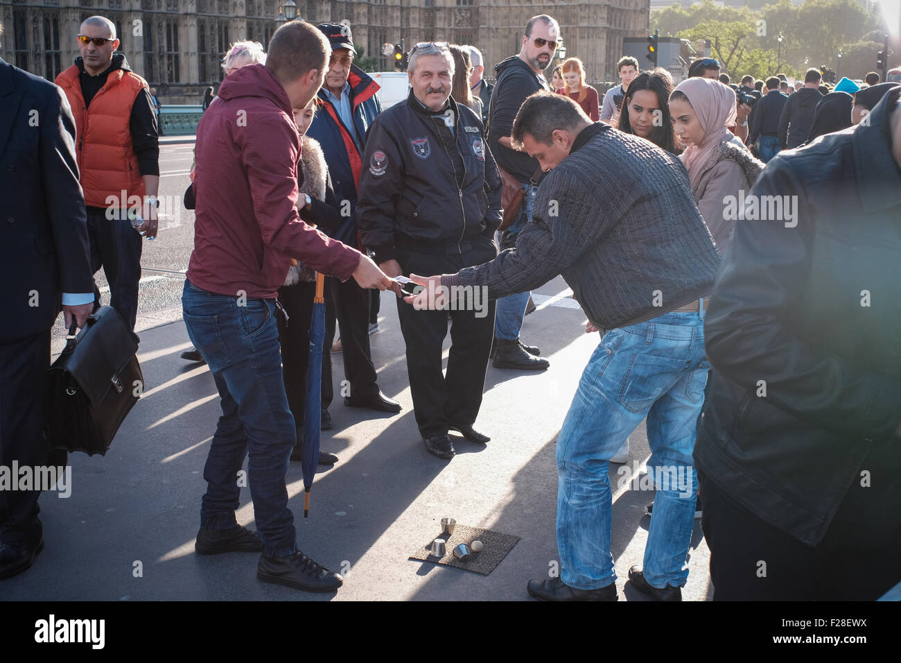 Street gamblers on Westminster bridge Stock Photo