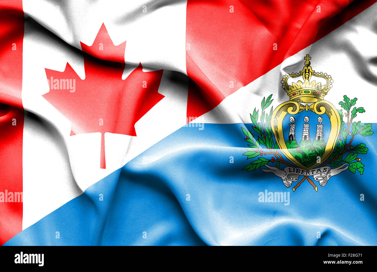 Waving flag of San Marino and Canada Stock Photo Alamy
