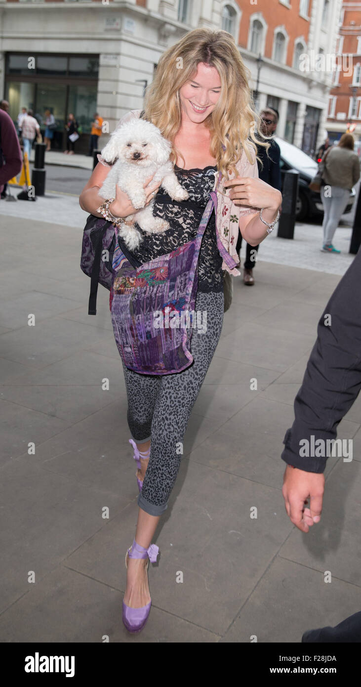 Joss Stone pictured arriving the Radio 1 studios with small dog with head down avoiding cameras  Featuring: Joss Stone Where: London, United Kingdom When: 14 Jul 2015 Stock Photo