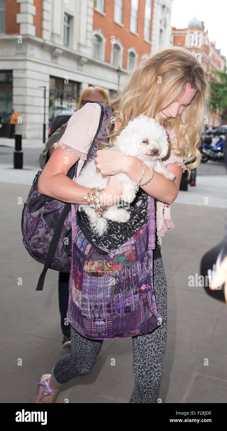 Joss Stone pictured arriving the Radio 1 studios with small dog with head down avoiding cameras  Featuring: Joss Stone Where: London, United Kingdom When: 14 Jul 2015 Stock Photo