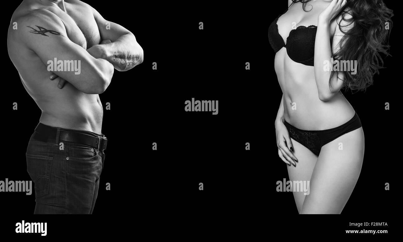 Man and woman's bodies isolated on a black background Stock Photo