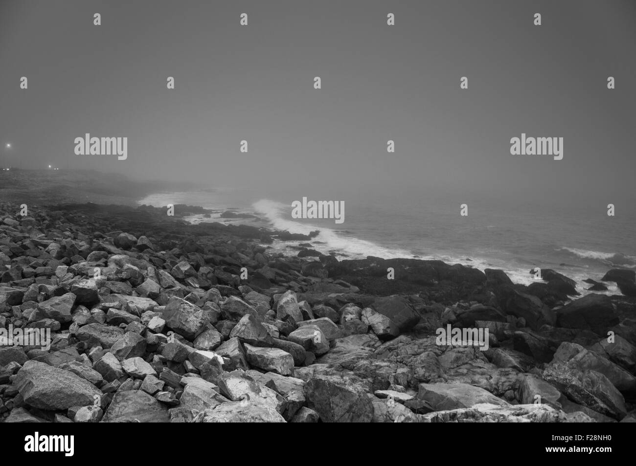 Fog on rocky North Atlantic coast.  Gloucester, MA Stock Photo
