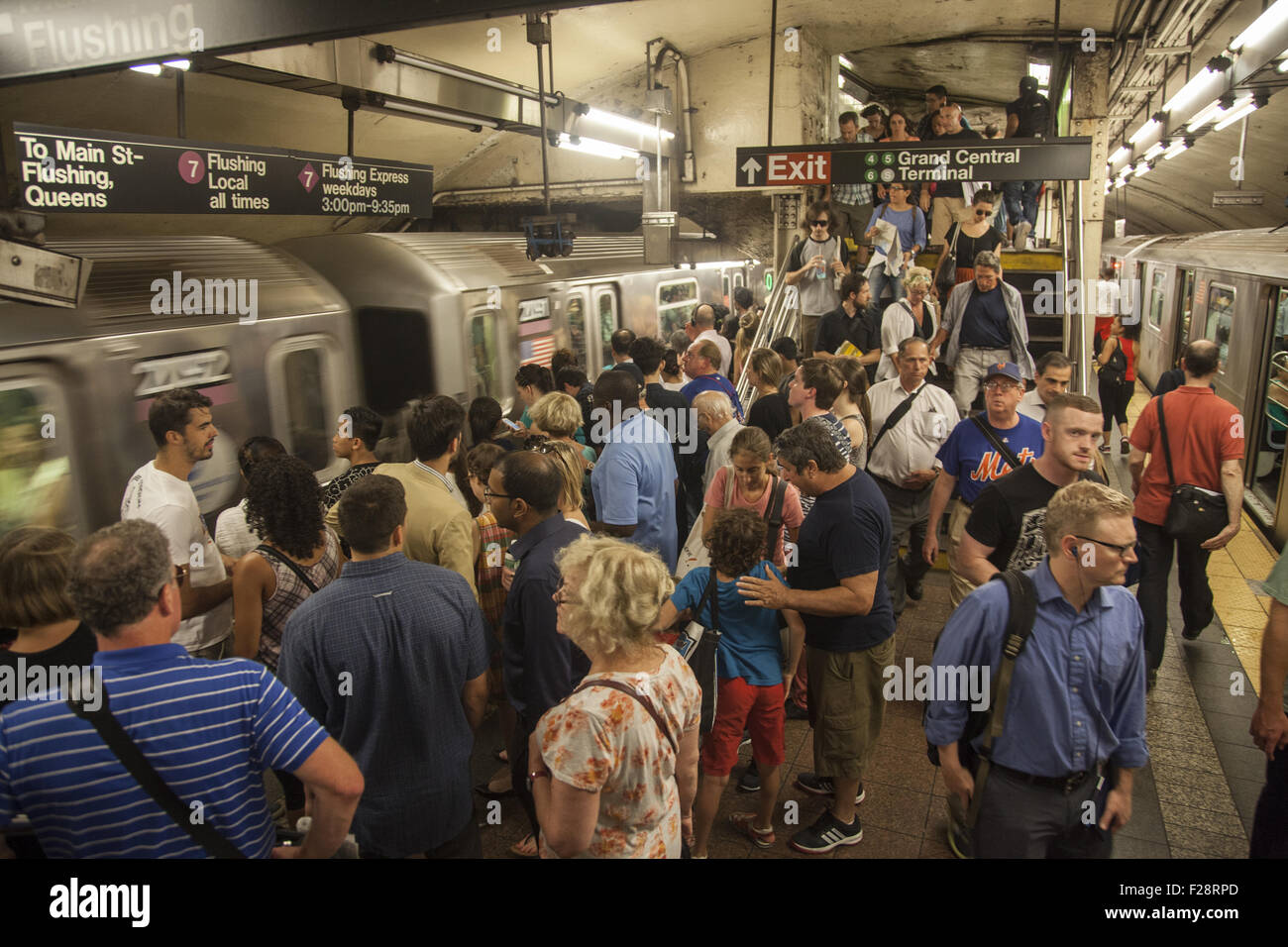 Evening rush hour at Grand Central Station on the platform of the #7 subway train line. NYC Stock Photo