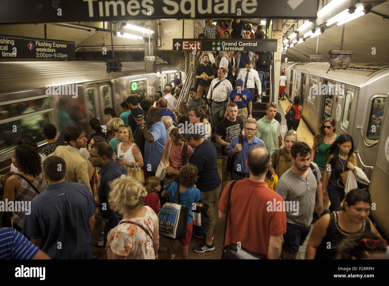Evening rush hour at Grand Central Station on the platform of the #7 subway train line. NYC Stock Photo