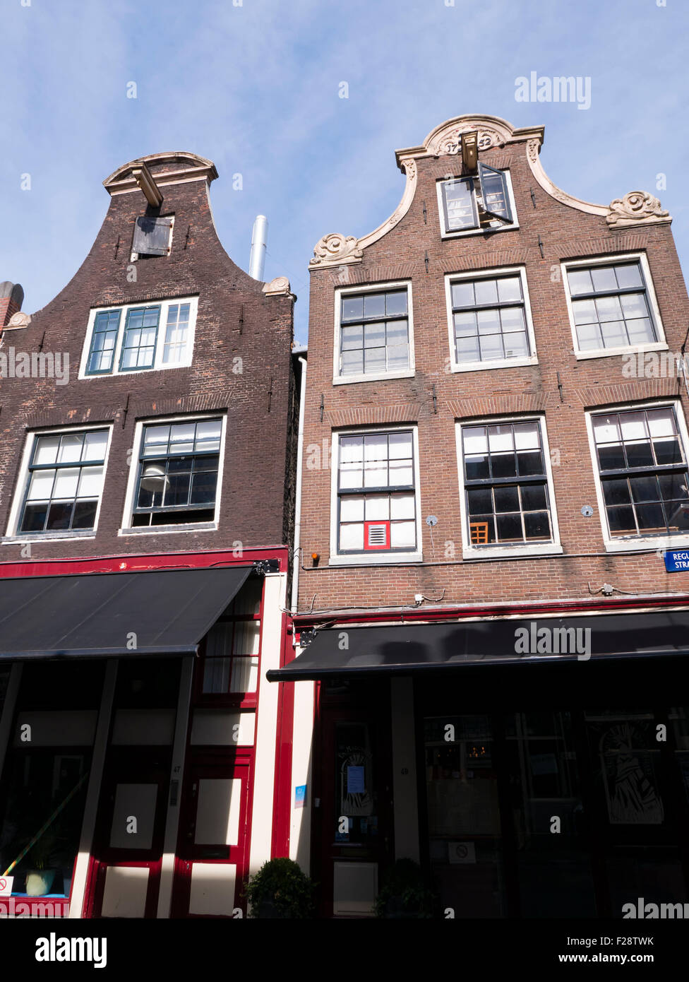 Traditional gabled architectural building fronts in Amsterdam. North Holland, Kingdom of Netherlands. Stock Photo