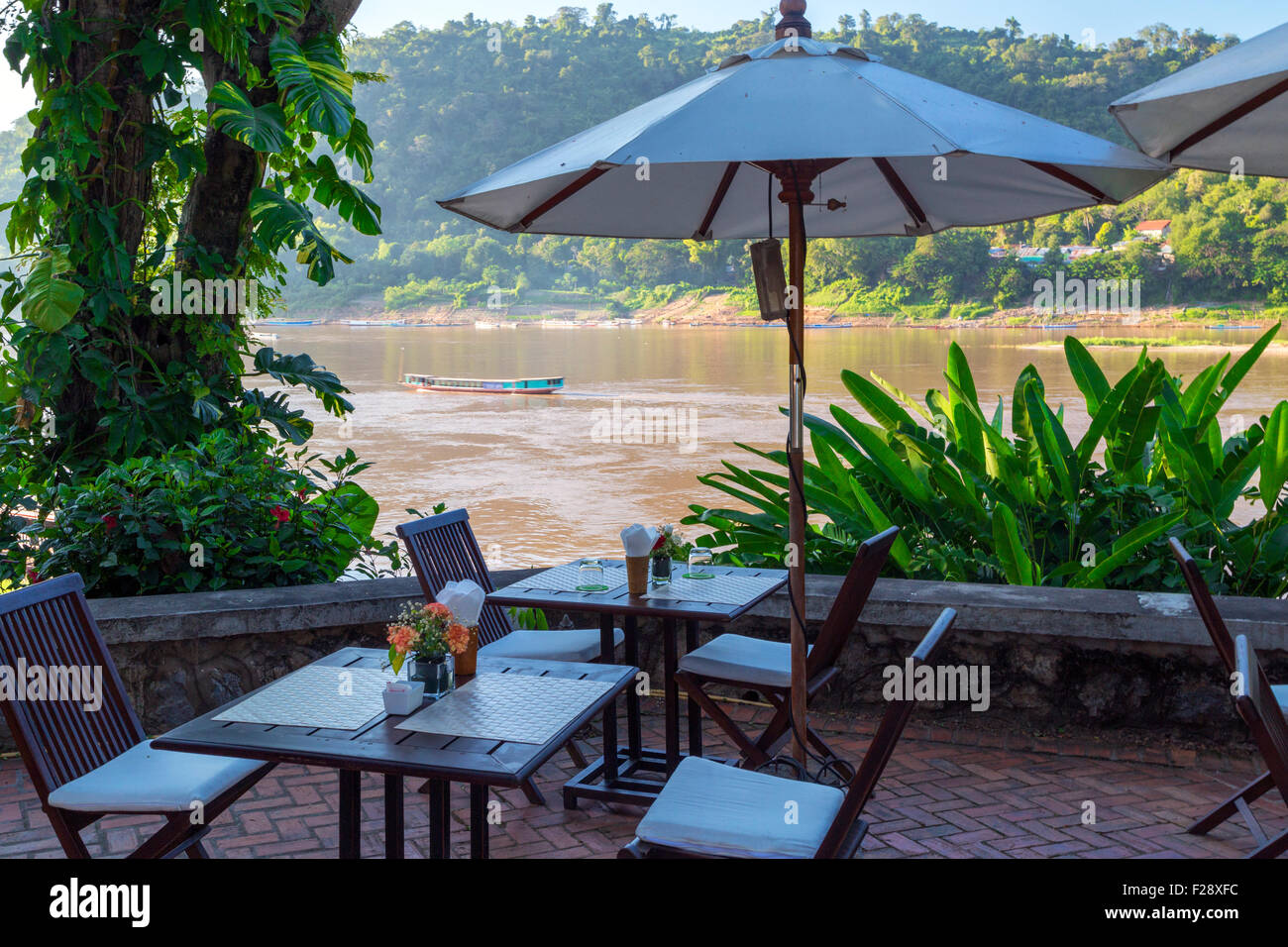 Restaurant beside Mekong river, Luang Prabang, Laos Stock Photo