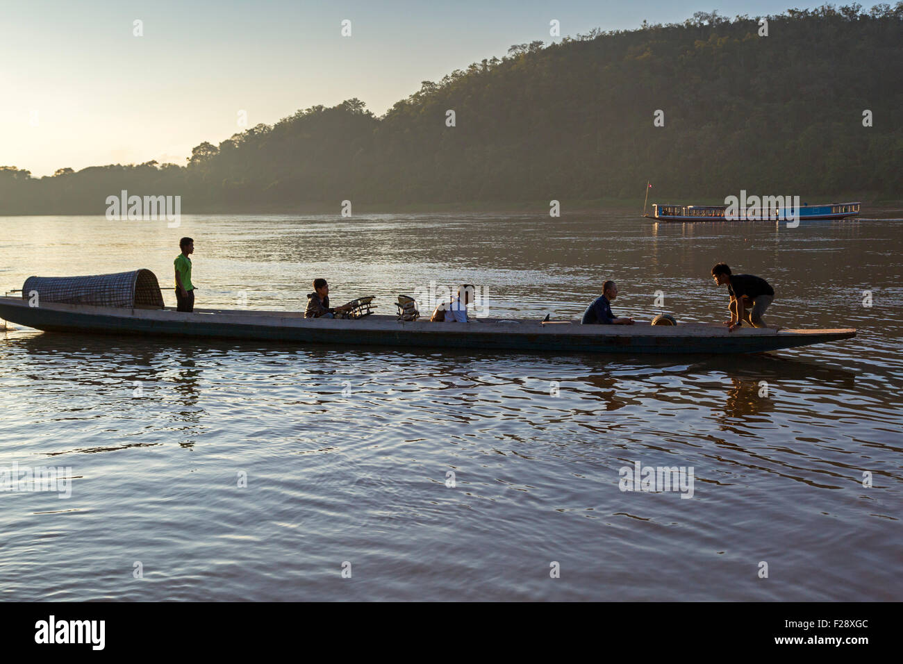Ferry boat on Mekong river at Luang Prabang, Laos Stock Photo