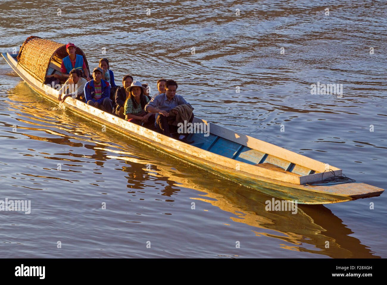 Passenger ferry boat on Mekong river at Luang Prabang, Laos Stock Photo