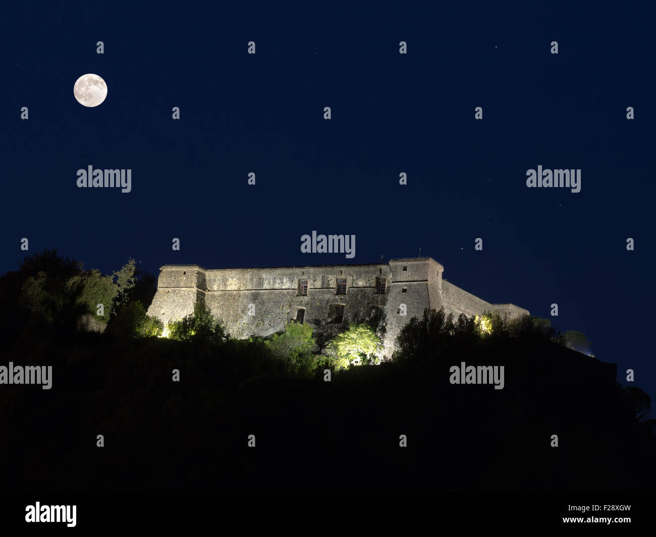 Landmark Brunella Fortress in Aulla, Massa Carrara. At night. Stock Photo