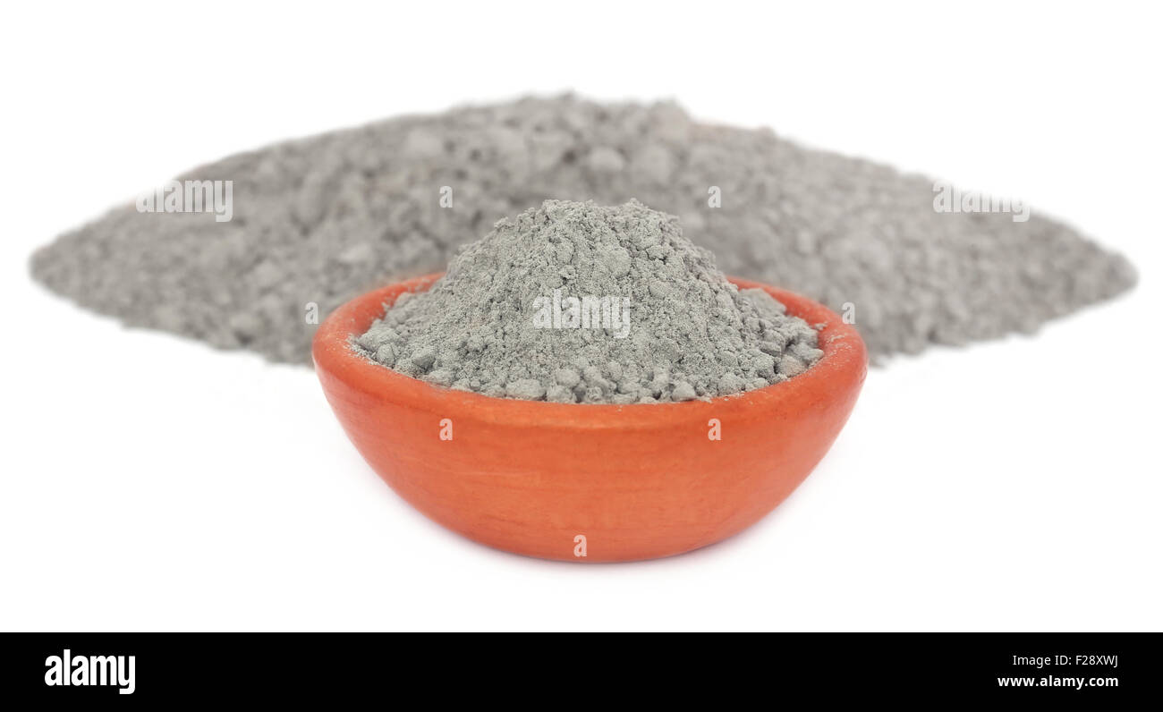 Grady cement powder in a bowl over white background Stock Photo - Alamy