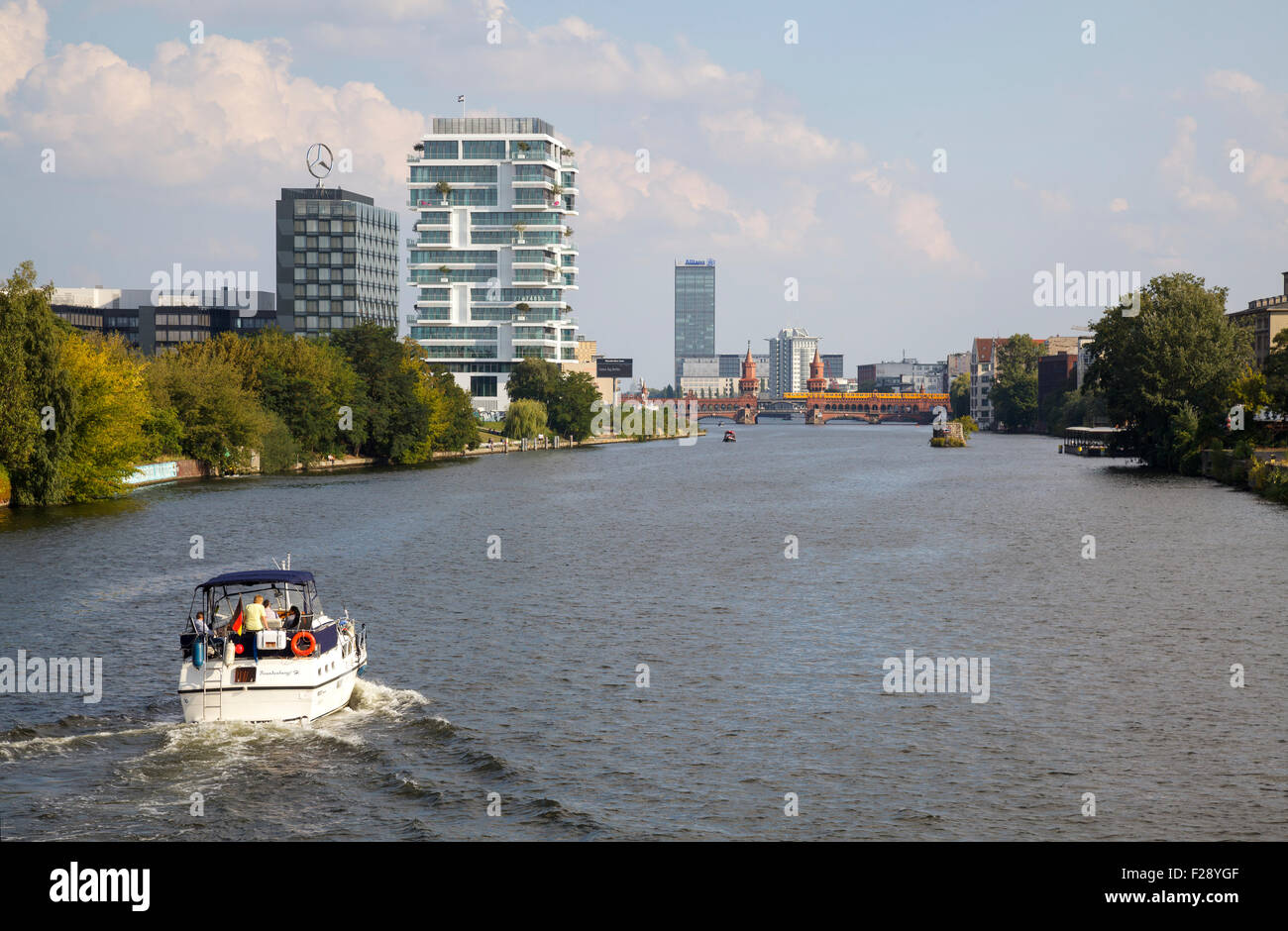 River Spree between Friedrichshain and Kreuzberg showing Berlins gentrification with new luxury apartment block, Berlin, Germany Stock Photo