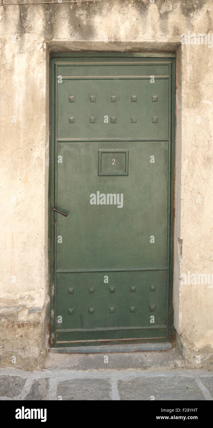Old metal armored door. Stock Photo
