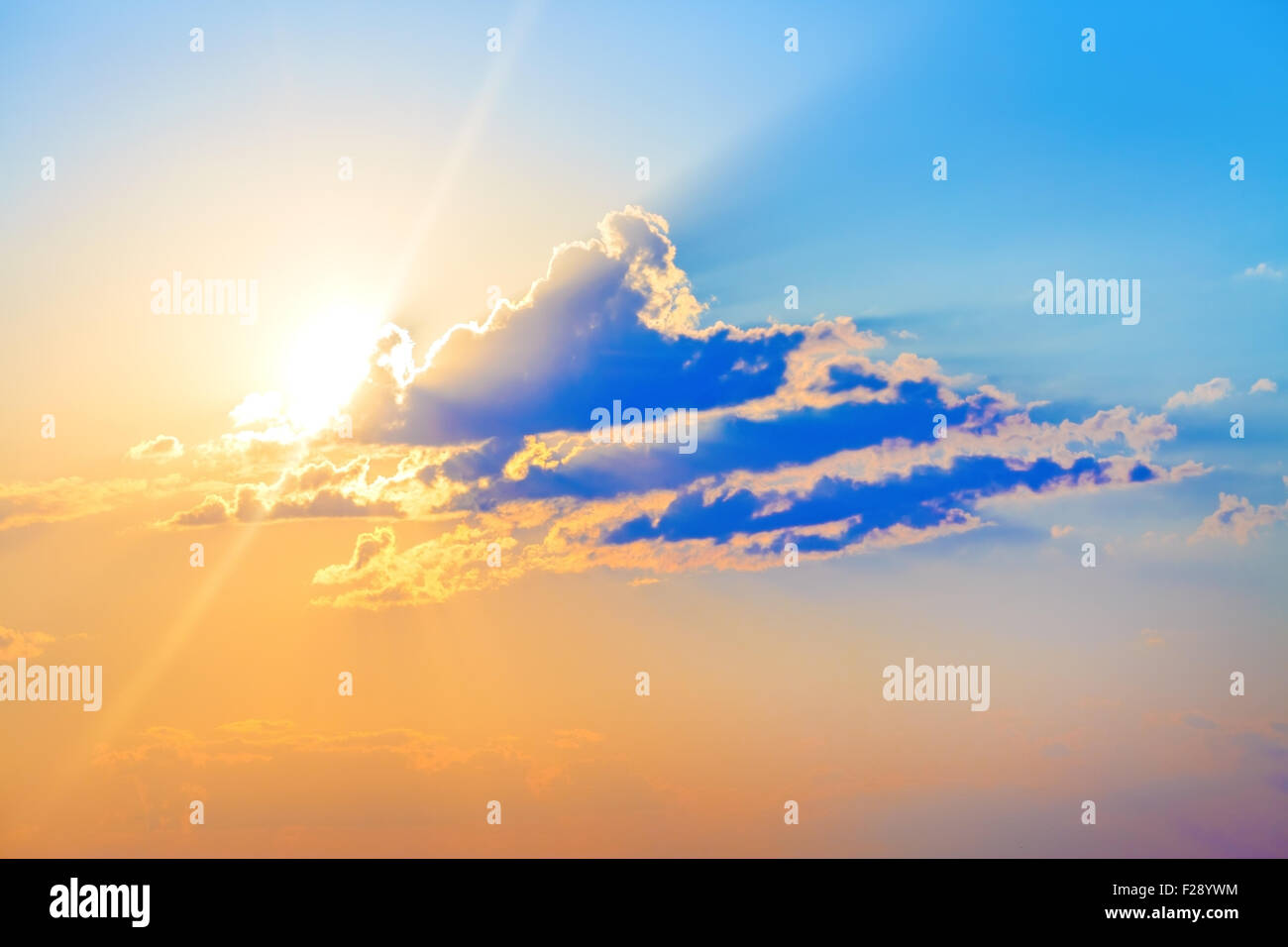 Colorful sunset. Scenic sky with clouds and bright sun Stock Photo - Alamy