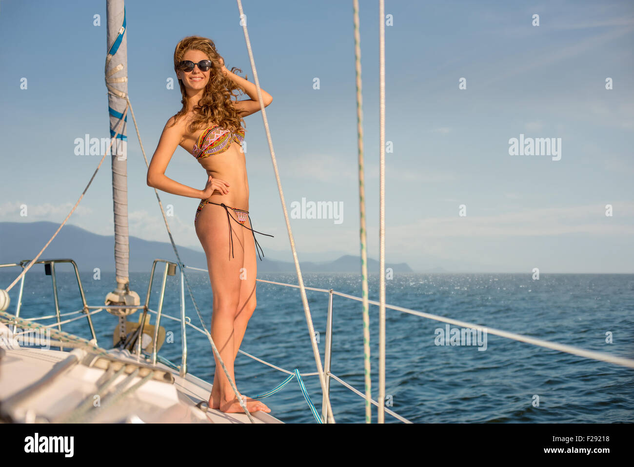 Girl resting on the yacht. Stock Photo