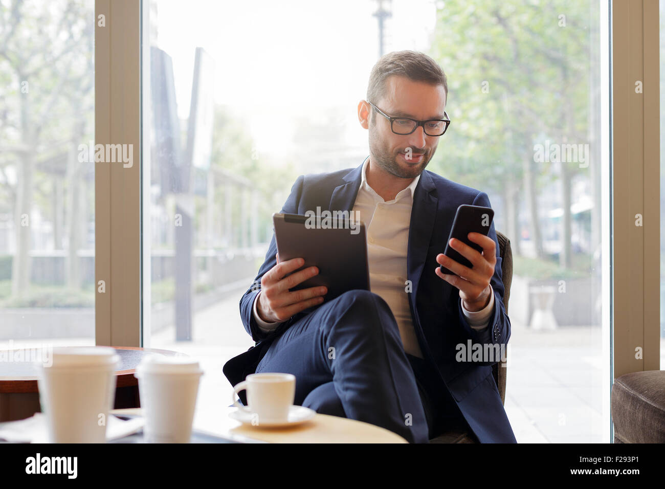 Businessman having a coffee break Stock Photo