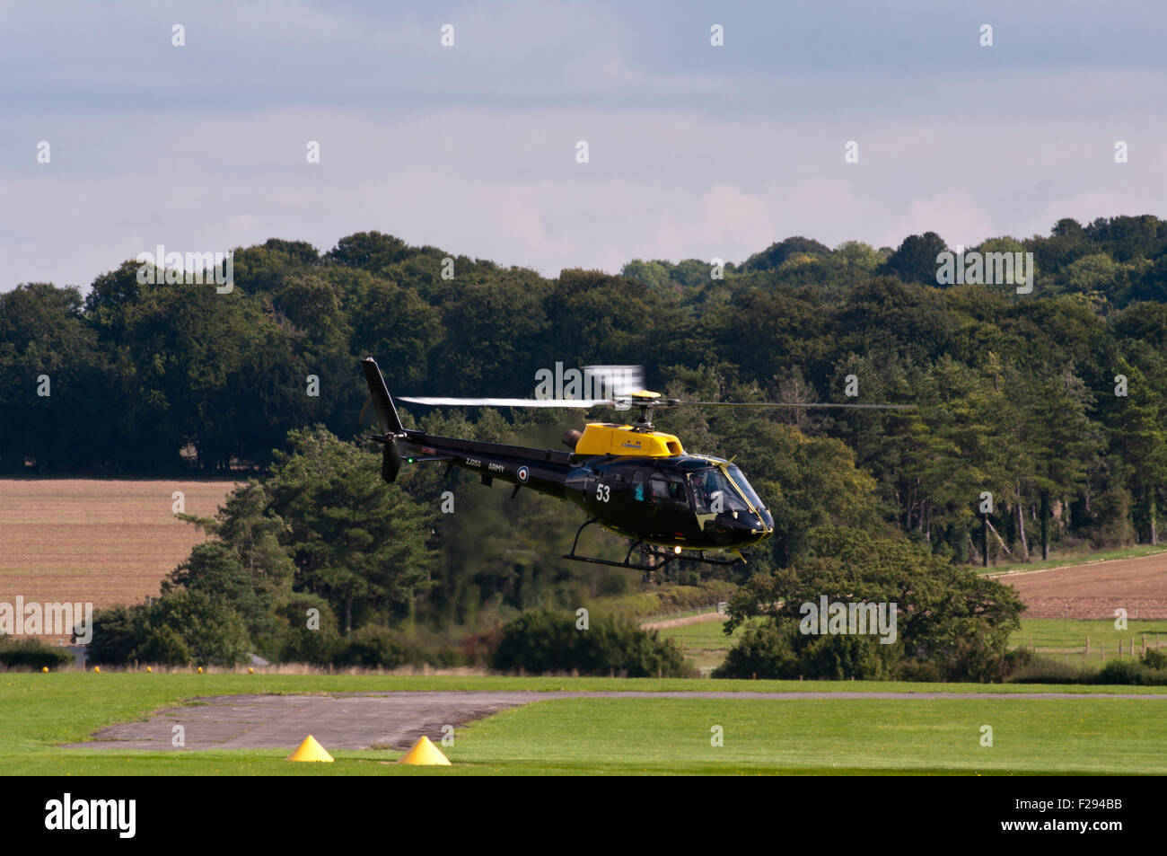 Side View Of A British Army Eurocopter AS-350BB Squirrel HT2 Helicopter landing Stock Photo