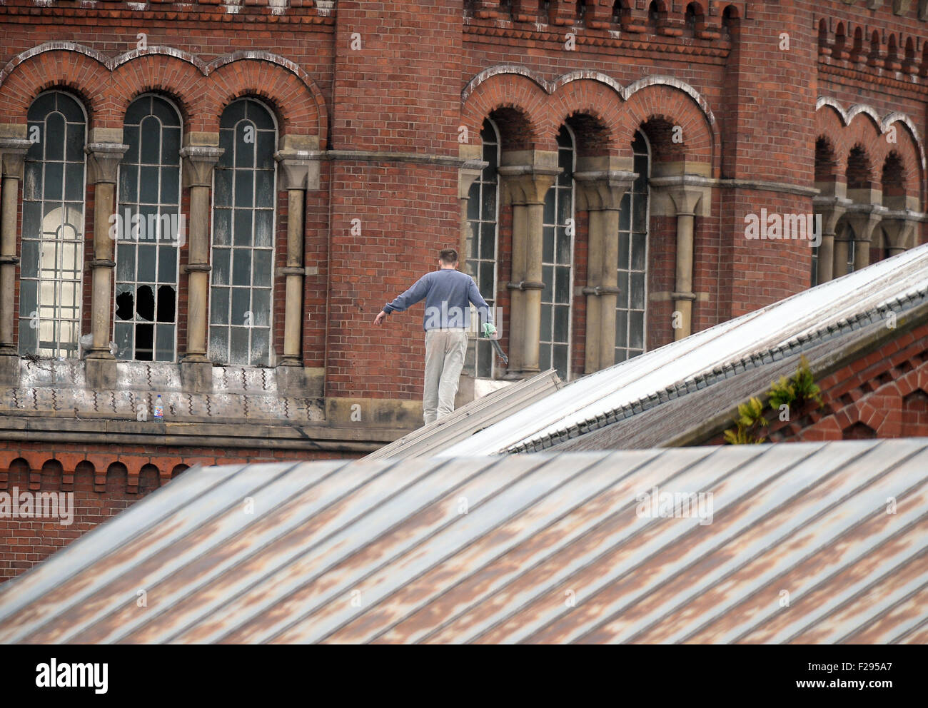 Prisoner Stuart Horner pictured on the roof of HMP Manchester. Stuart Horner's one man protest is about prison conditions Stock Photo