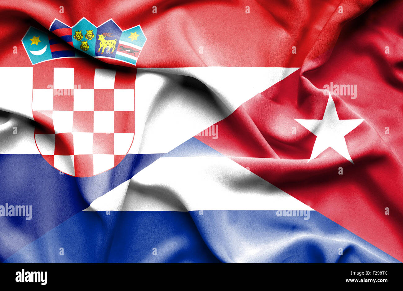 Waving flag of Cuba and Croatia Stock Photo