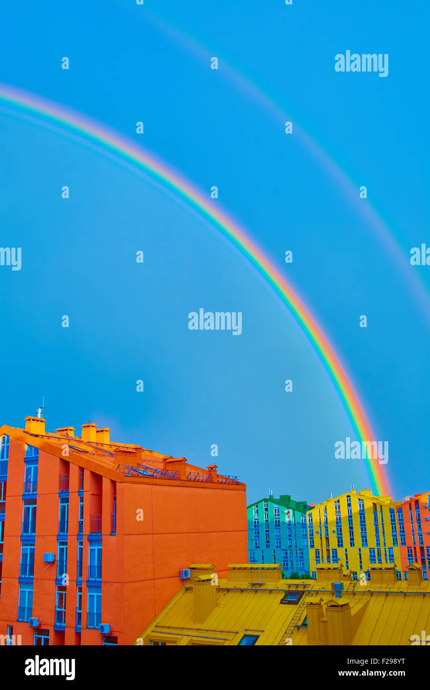 Double rainbow over the city Stock Photo - Alamy