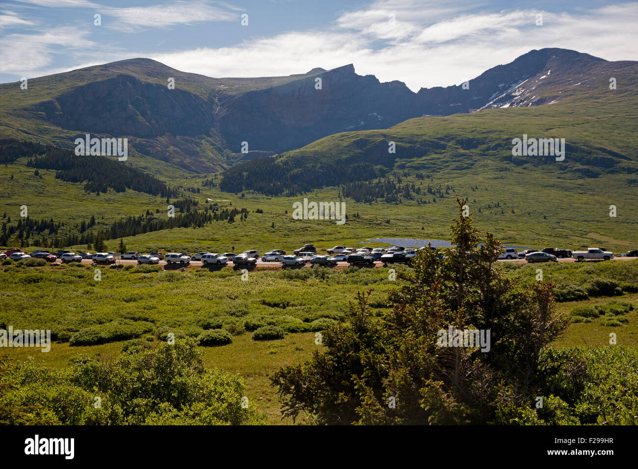 Colorado Cars overflow the parking lots and line the road