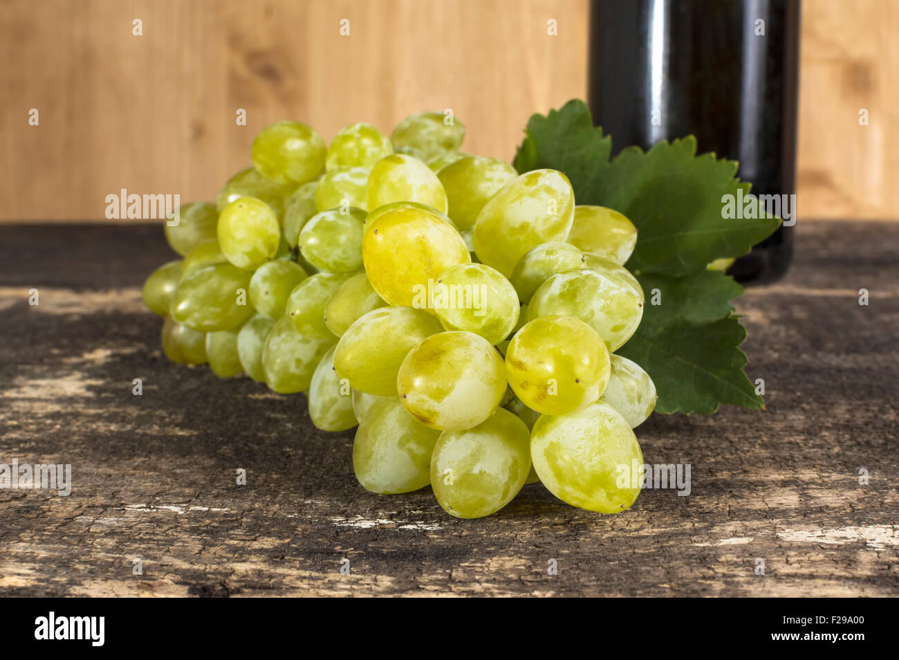 Ripe delicious grapes on wooden table. Selective focus. Stock Photo