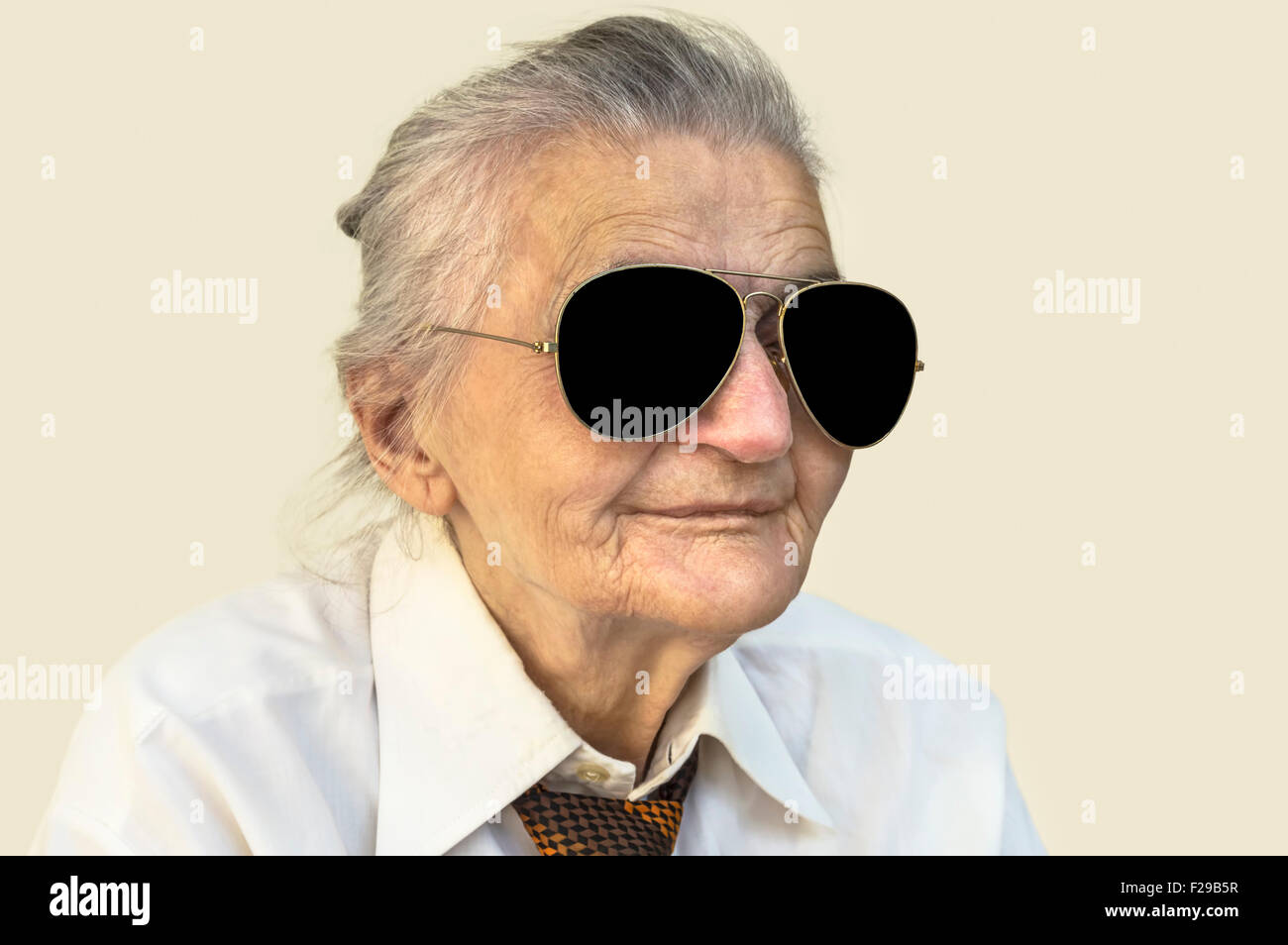 Portrait of elderly woman with sunglasses. Selective focus. Stock Photo