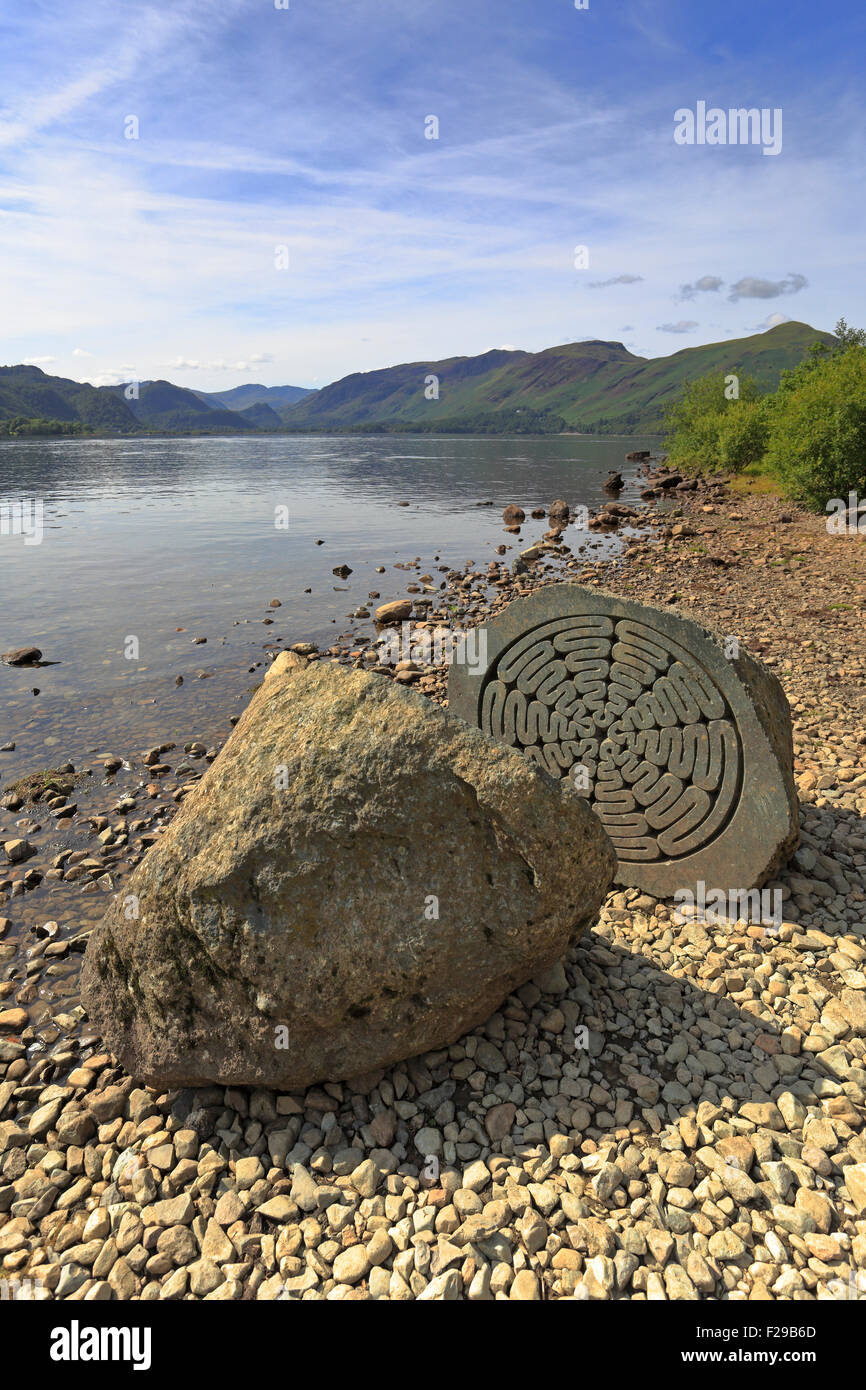 National Trust Millenium stone at Calfclose Bay, Dewent Water, Cumbria, Lake District National Park, England, UK. Stock Photo