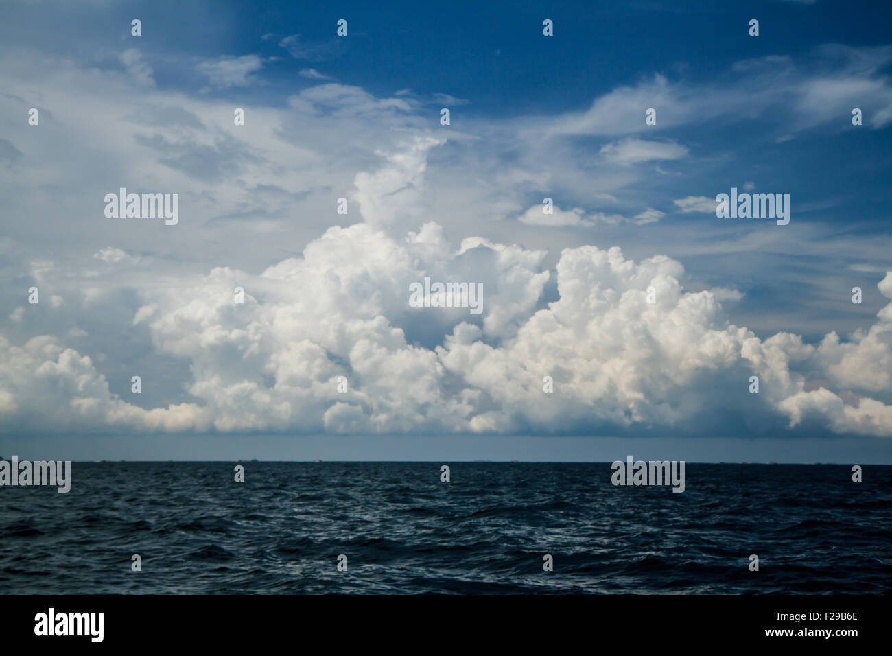 Cloudy sky in the sea Stock Photo - Alamy