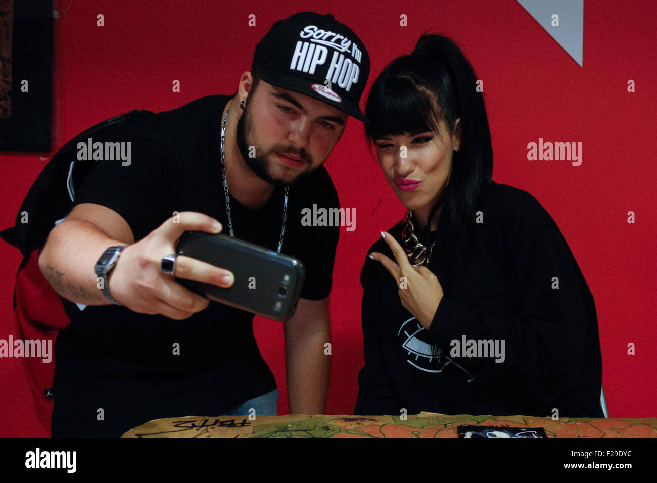 Turin Italy 14th Sep 2015 The Italian Woman Rapper Claudia Nahum Also Known As Baby K Poses With Her Fan During The Autograph Signing Of Her New Album Kiss Kiss Bang Bang Turin Italy 14th Sep 2015 The Italian Woman Rapper Claudia Nahum Also Known As Baby K Poses With Her Fan During The Autograph Signing Of Her New Album Kiss Kiss Bang Bang