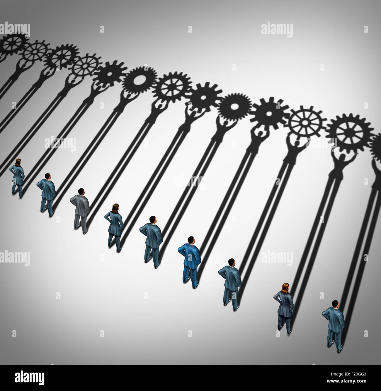 Businesspeople teamwork gears business concept as a diverse group of businessmen and businesswomen working together with cast shadows holding cogwheels connected in a corporate partnership for team success. Stock Photo