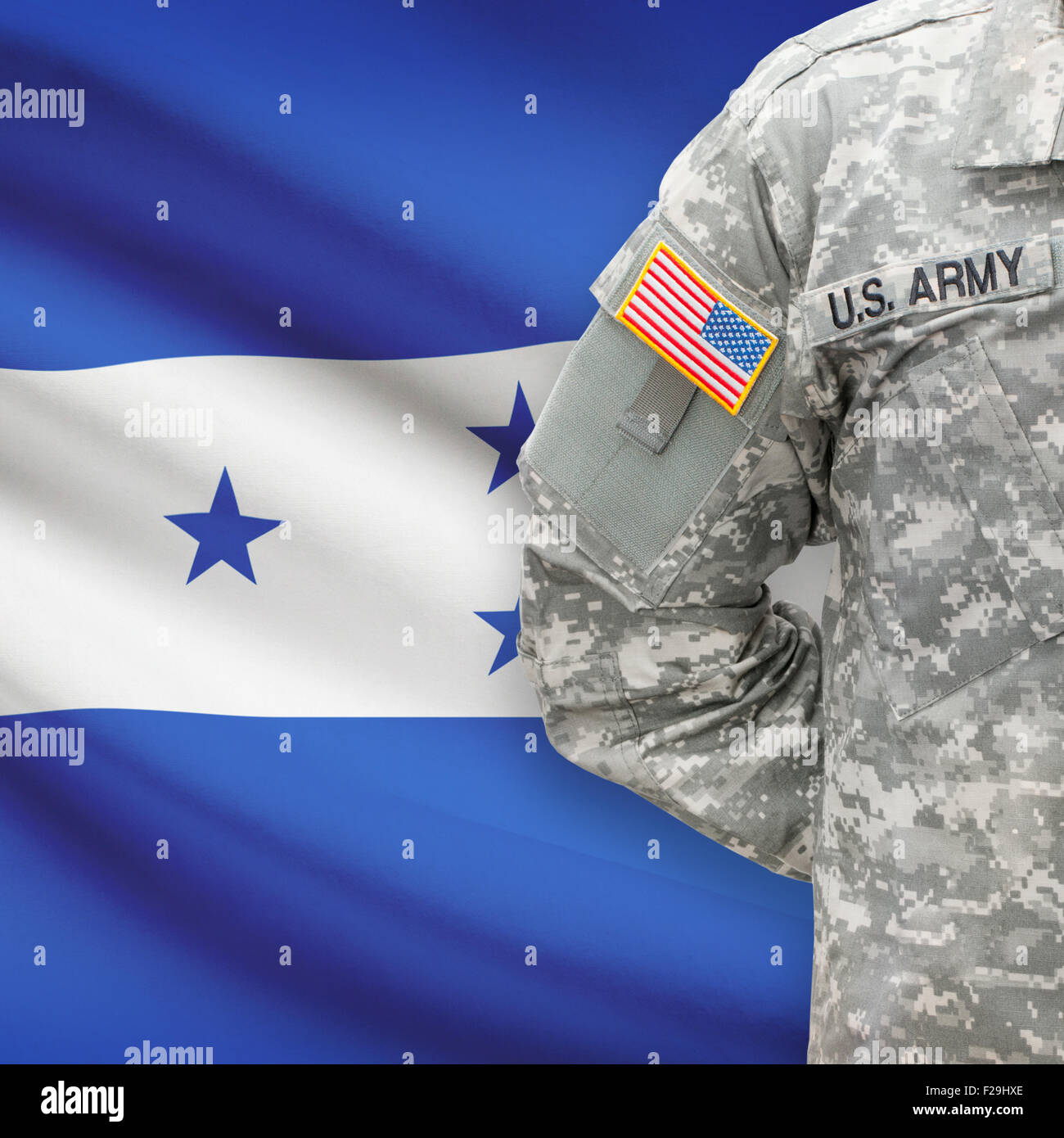 American soldier with flag on background series - Honduras Stock Photo