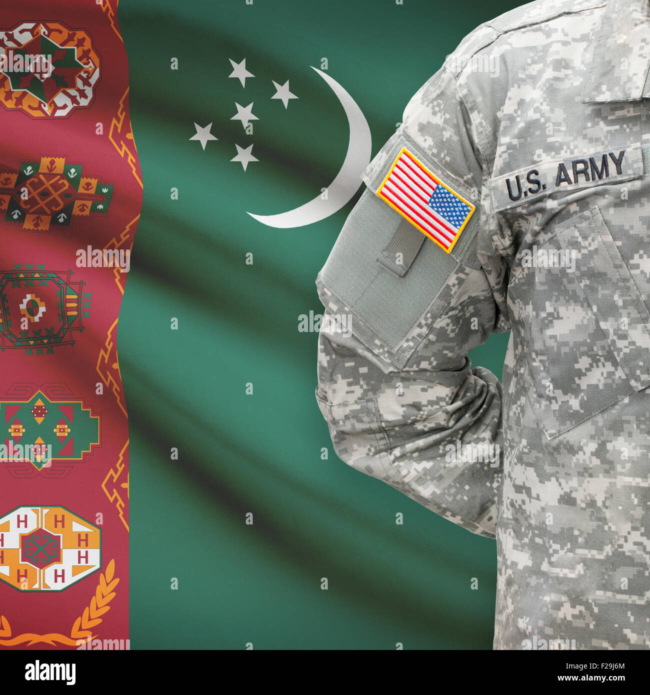 American soldier with flag on background series - Turkmenistan Stock Photo