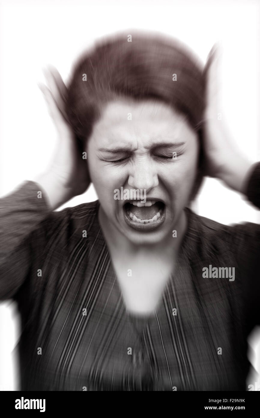 Noise and stress concept - woman covering her ears Stock Photo