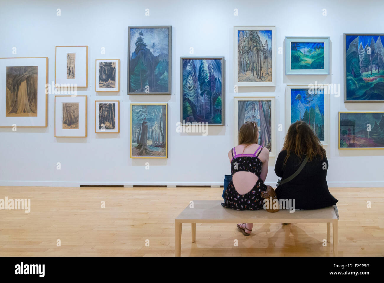 Women enjoying Emily Carr paintings in gallery at Vancouver Art Gallery, Vancouver,  British Columbia, Canada Stock Photo